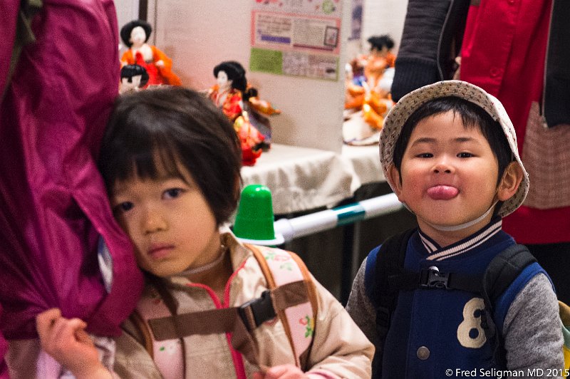 20150312_104001 D4S.jpg - Children visiting museum area at Nagoya Castle.  Well-mannered and quite interested in what they see.